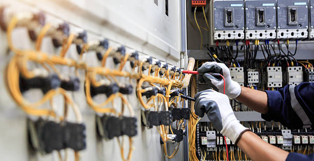 Professional Electrician technician working in St. John, MO